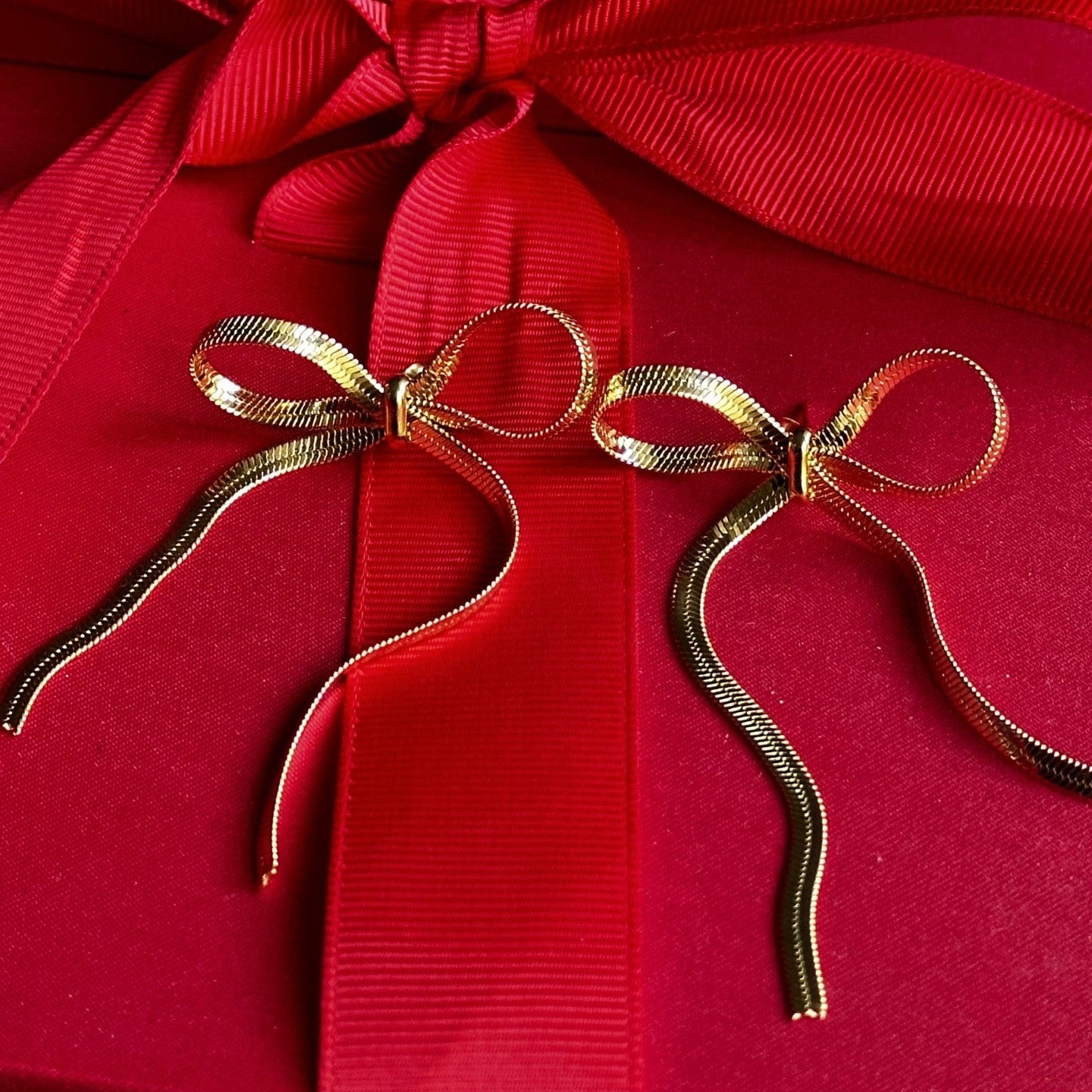 Serpent Bow Dangle Earrings
